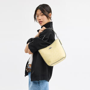 City Bucket Bag In Signature Canvas